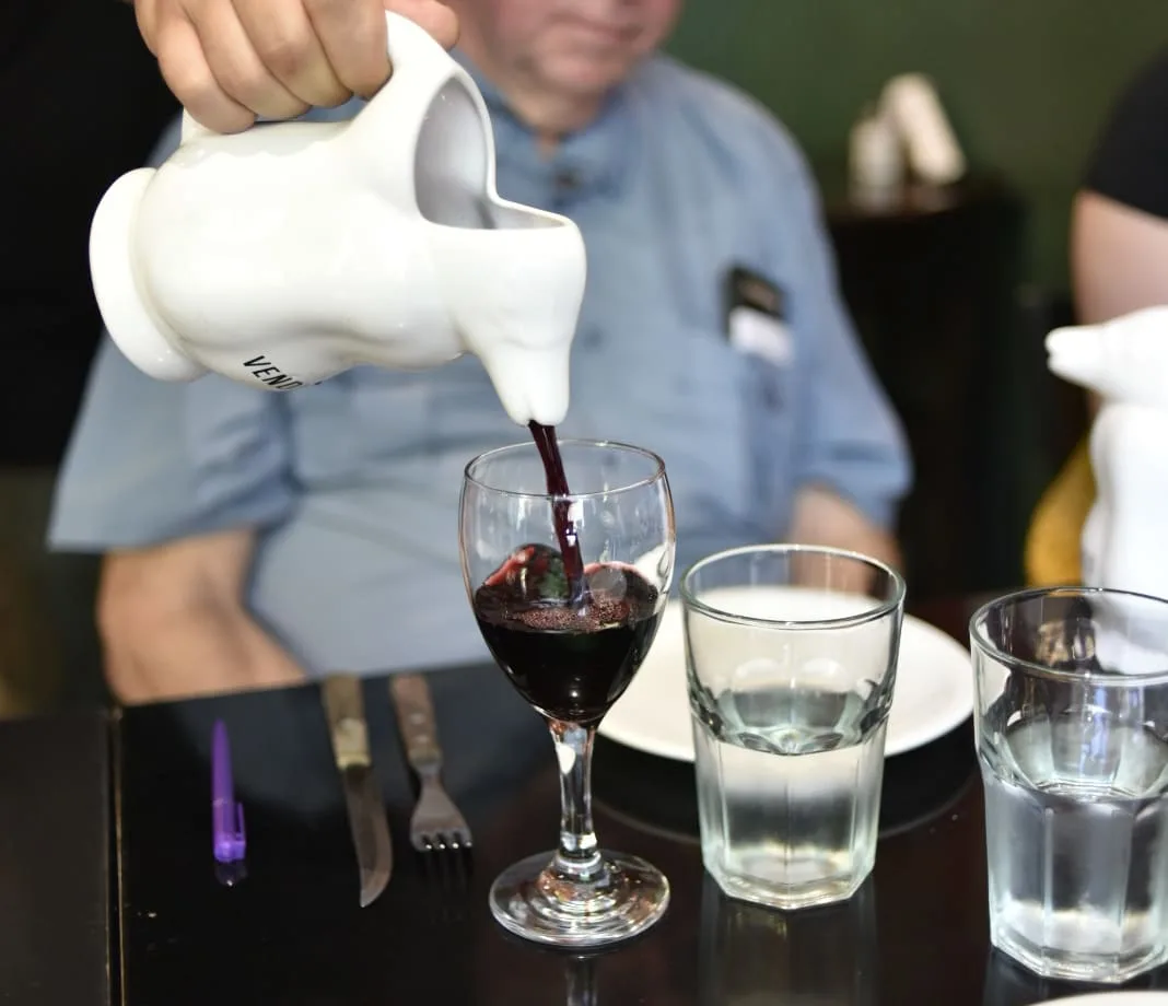 The iconic penguin jar, typically used to serve house wine.